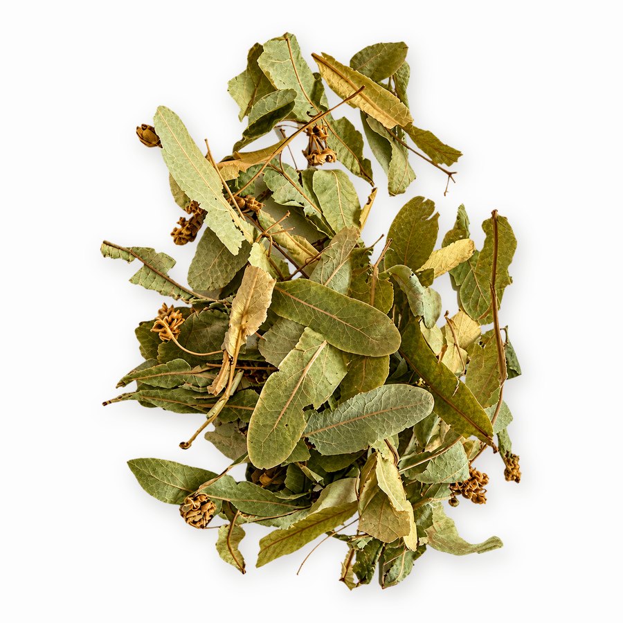 Actual image of substance used: dried linden (Tilia) leaves and flower clusters loosely piled on a white background